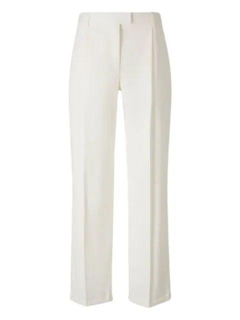 The Row flared trousers