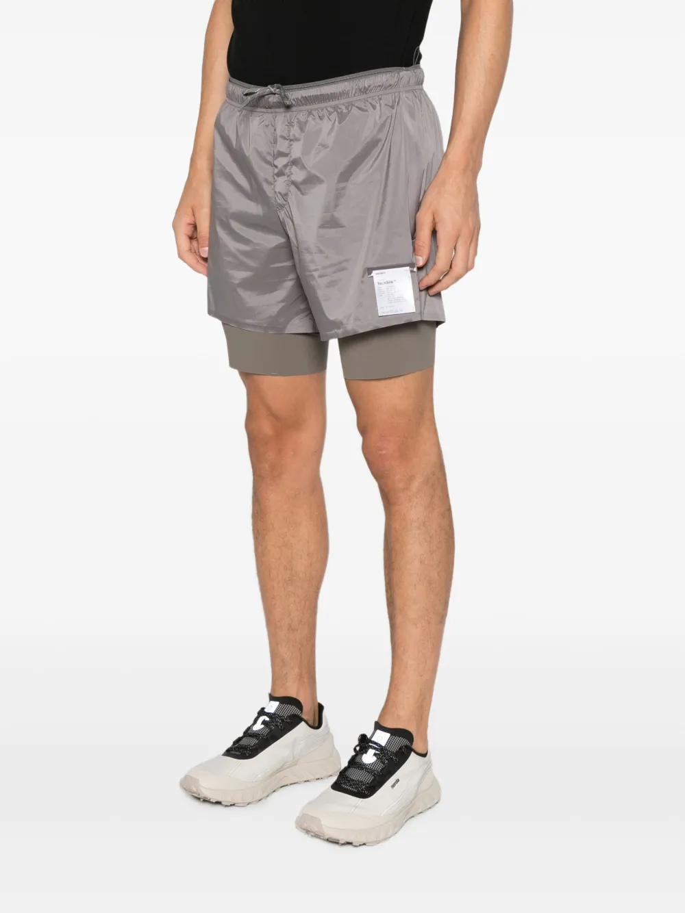 Satisfy Gelaagde shorts Beige