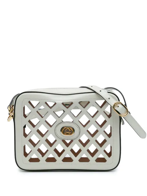 Gucci Pre-Owned 2016-2025 Cutout Leather and Flora Canvas Infinity crossbody bag