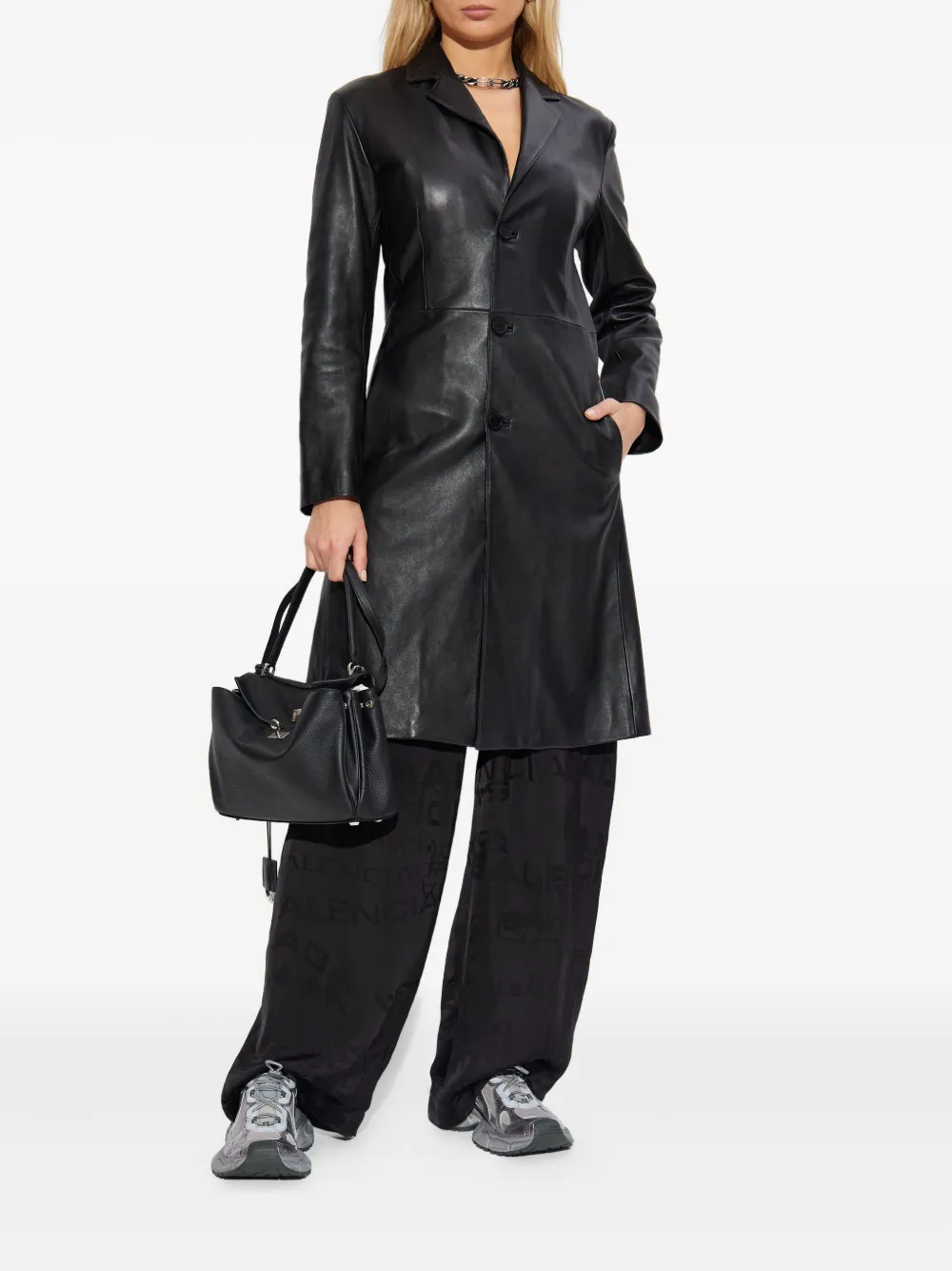 Balenciaga Flared broek met logo Zwart