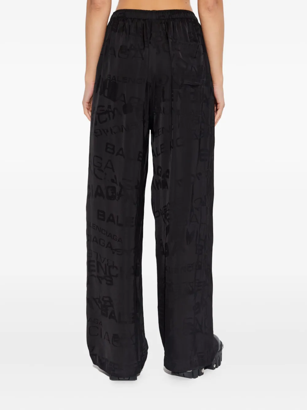 Balenciaga Flared broek met logo Zwart