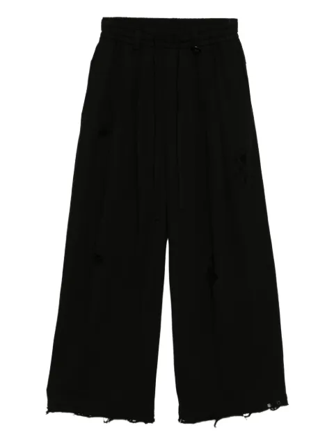 TEAM WANG design pants con efecto envejecido