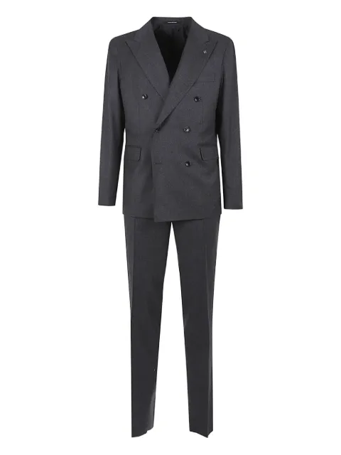 Tagliatore traje con doble botonadura