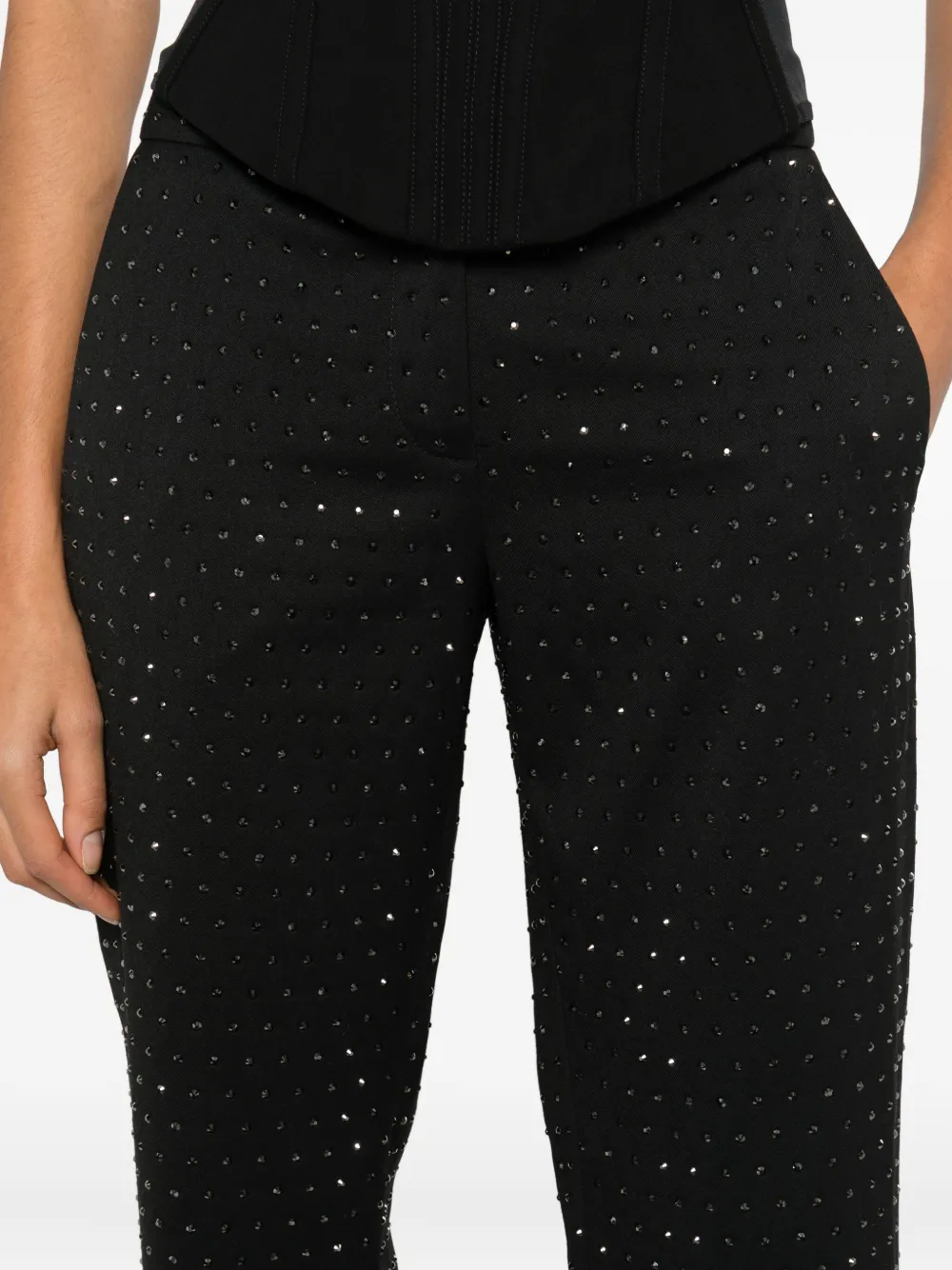 The Andamane Flared High Waist Trousers With Stud Embellishments In Black
