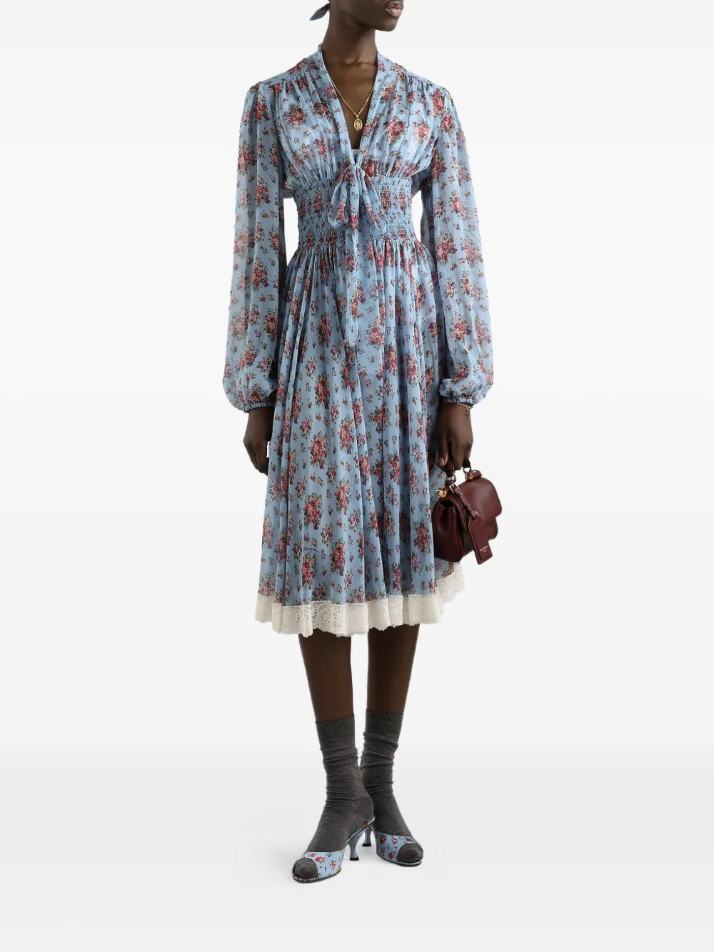 Dolce & Gabbana Jurk met bloemenprint en gestrikt detail Blauw