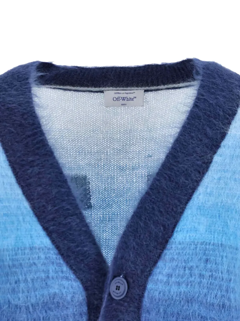 Off-White Vest met V-hals en pijldetail Blauw