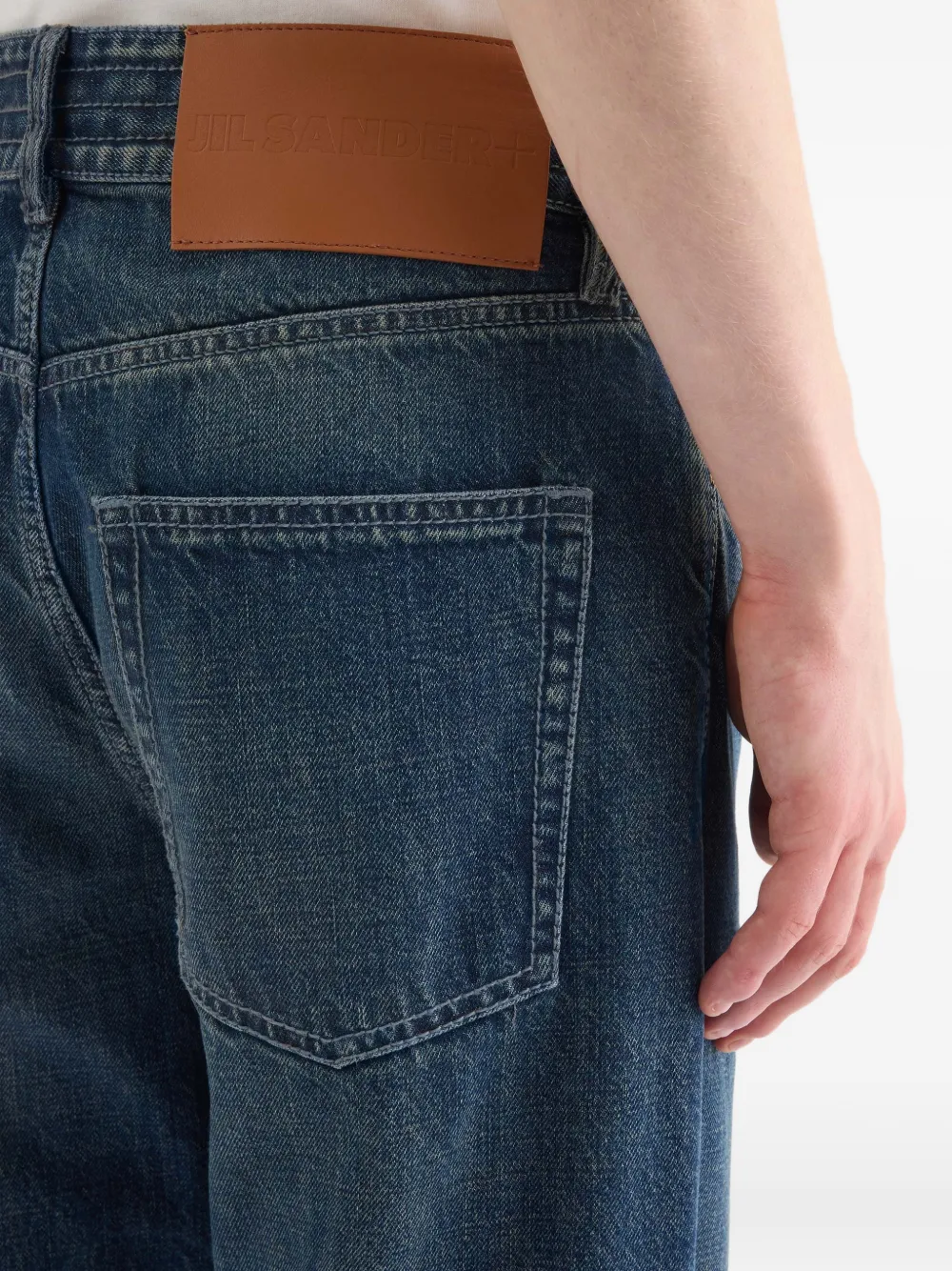 Jil Sander Multi-stitched Embossed Logo Trousers In Blue