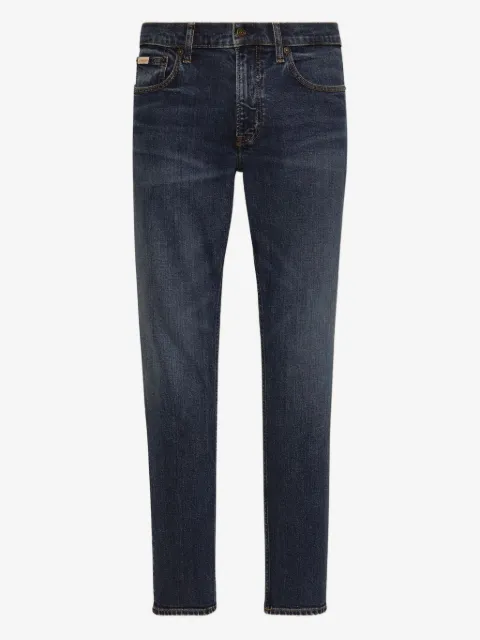 Calvin Klein jeans con parche del logo