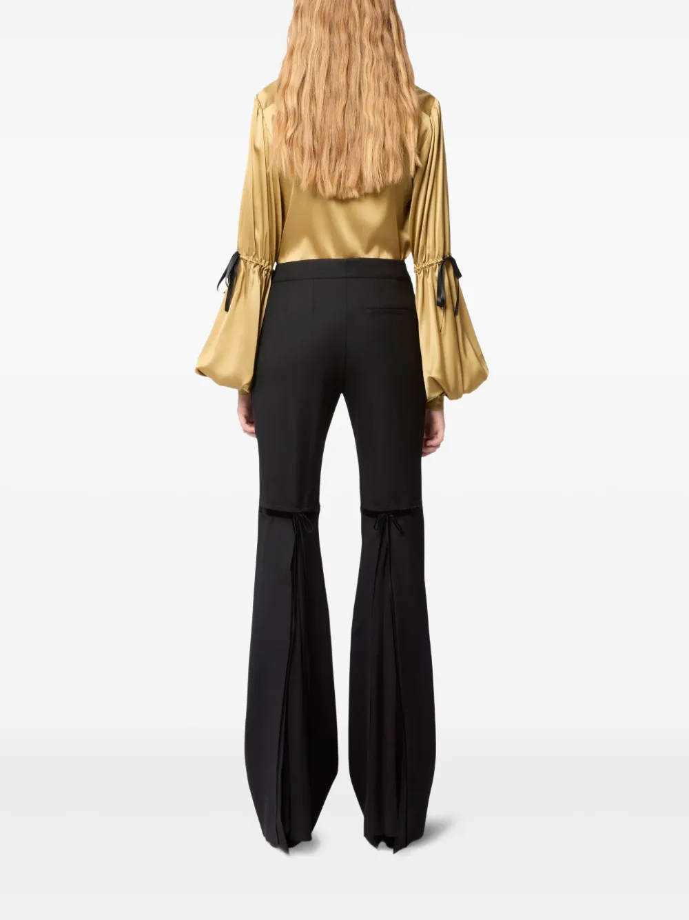Nina Ricci Flared broek met strik Goud