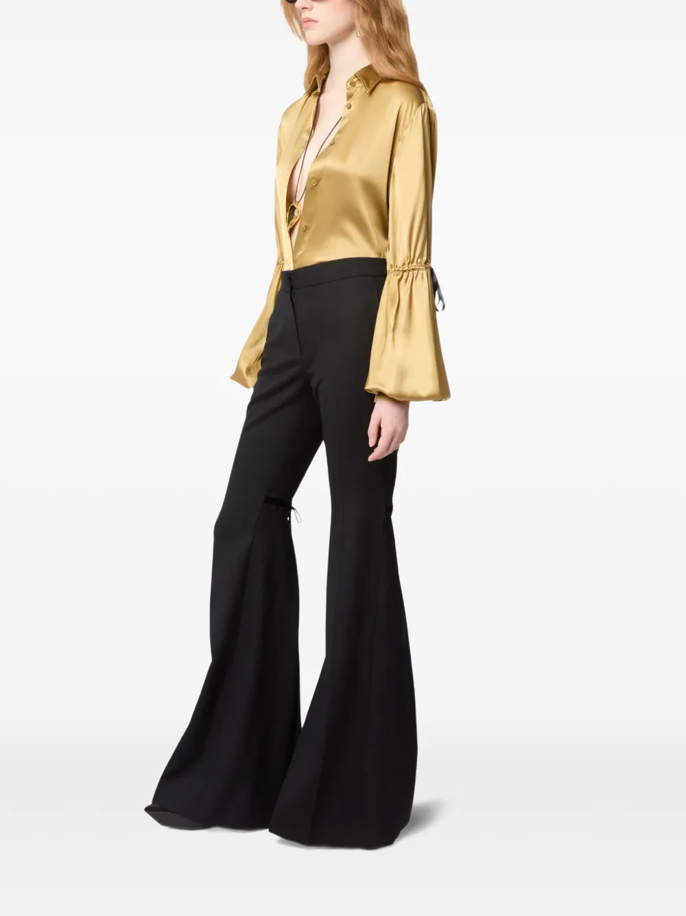 Nina Ricci Flared broek met strik Goud