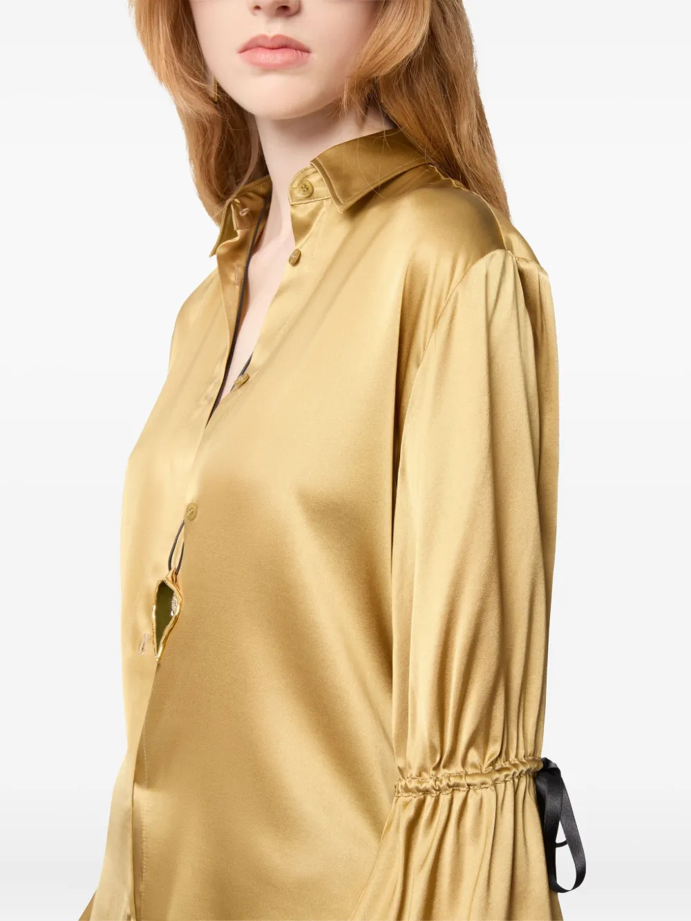 Nina Ricci Zijden blouse met strik Goud