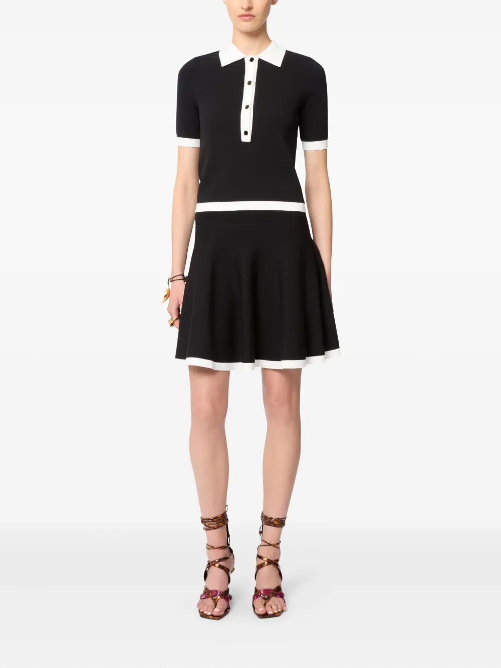 Nina Ricci Tweekleurige polotop met knopen - Zwart