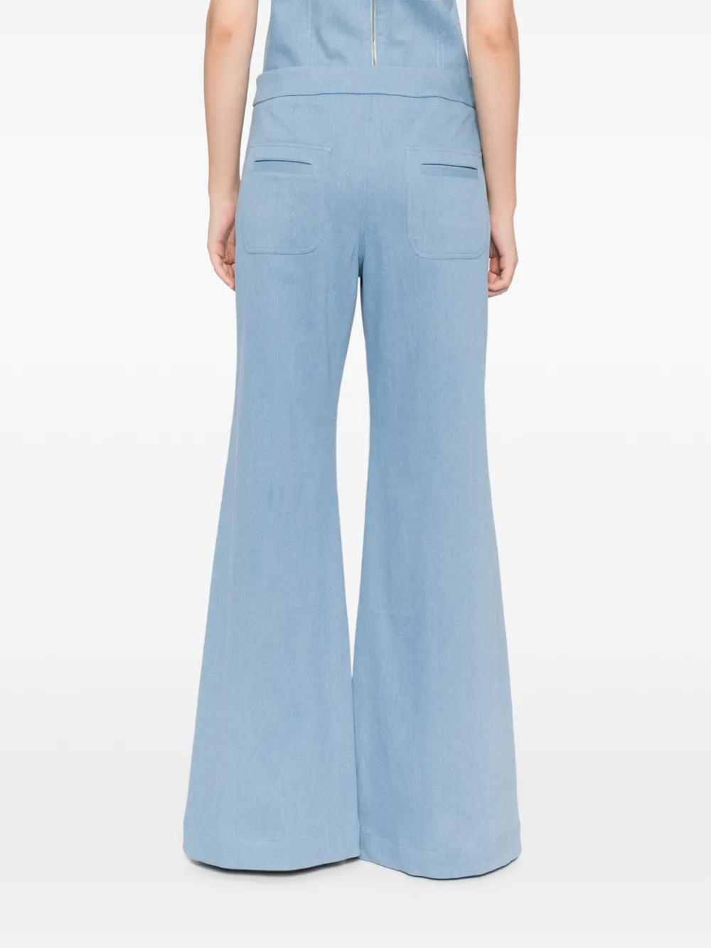 BLAKLACE Flared broek met knoop Blauw