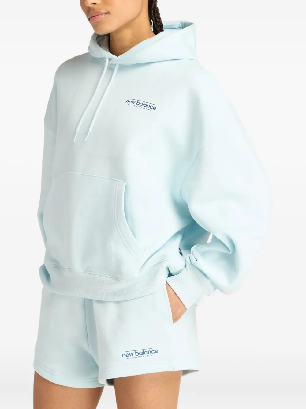 New Balance Reimagined gradient-logo hoodie - Blauw