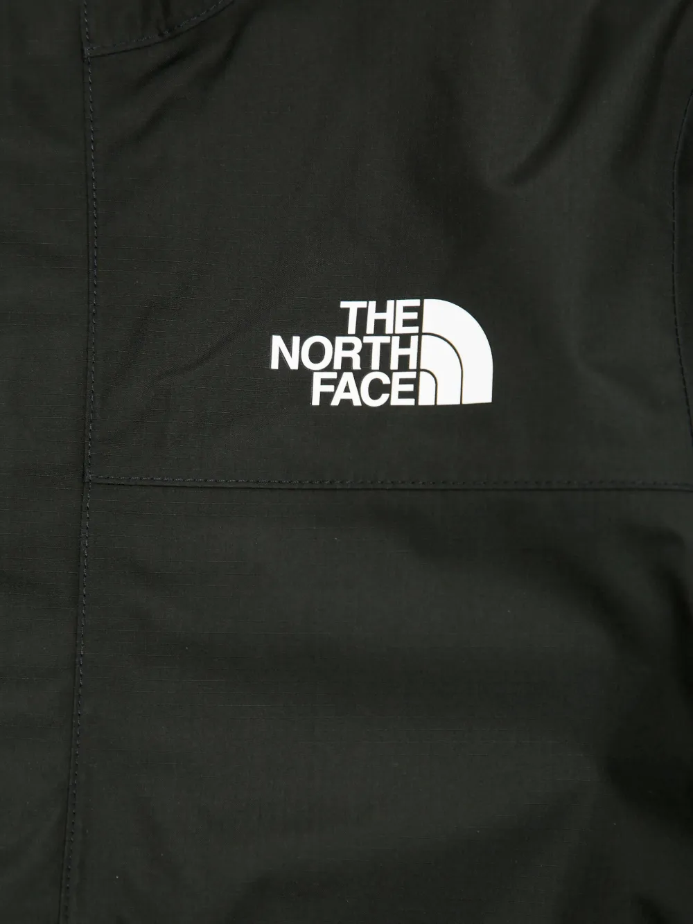 The North Face Kids Regenjack met capuchon Zwart