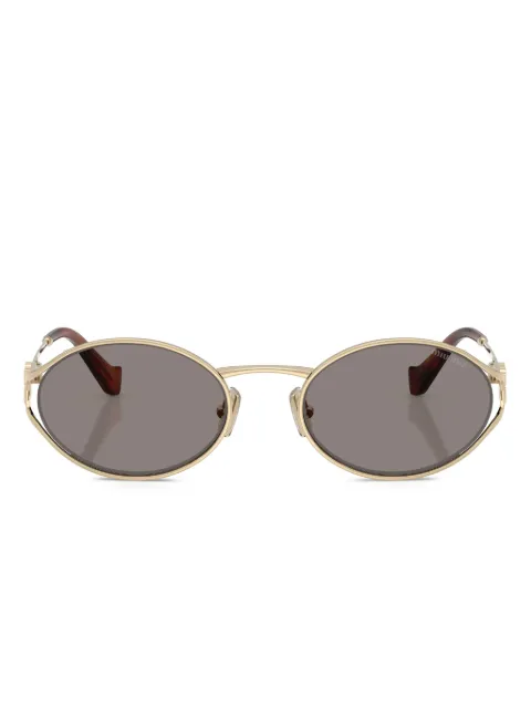 Miu Miu Eyewear lentes de sol con armazón redonda