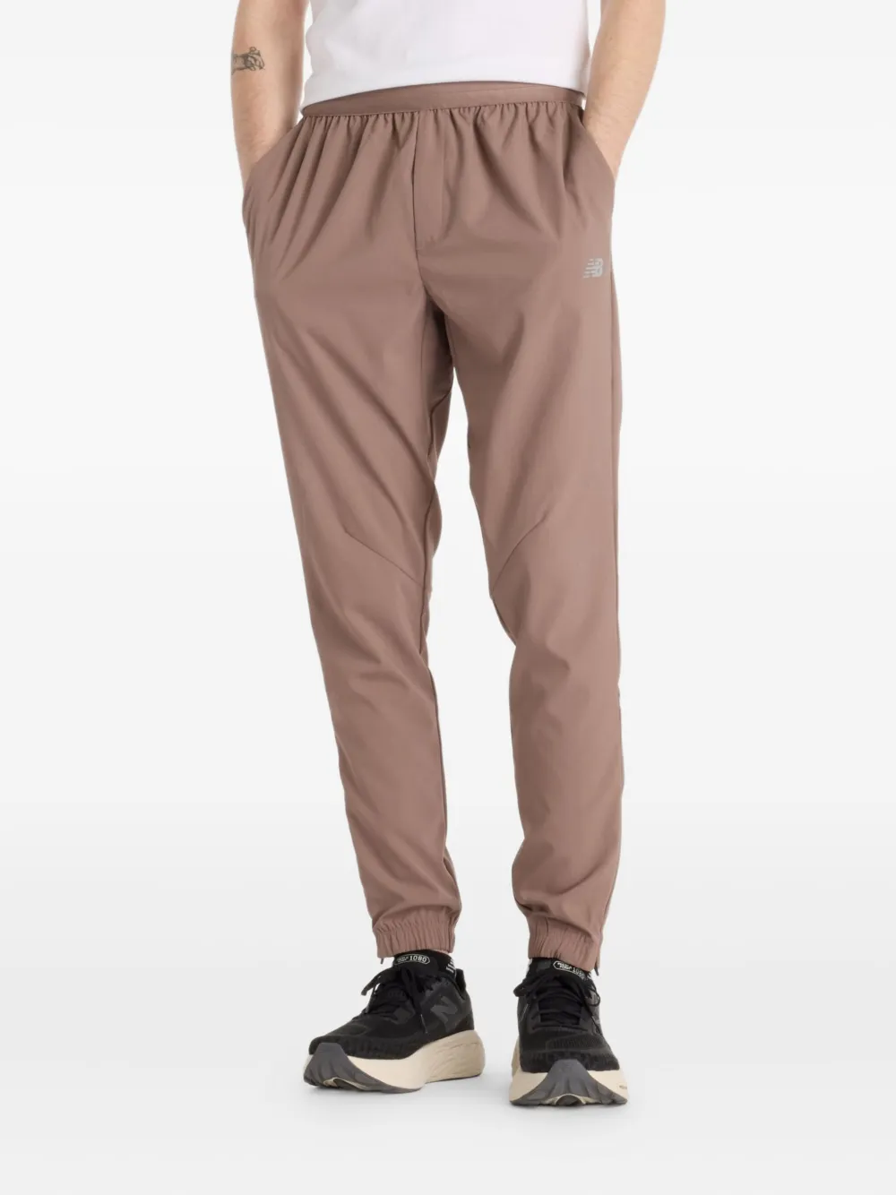 New Balance Pantaloni sportivi AC - Marrone