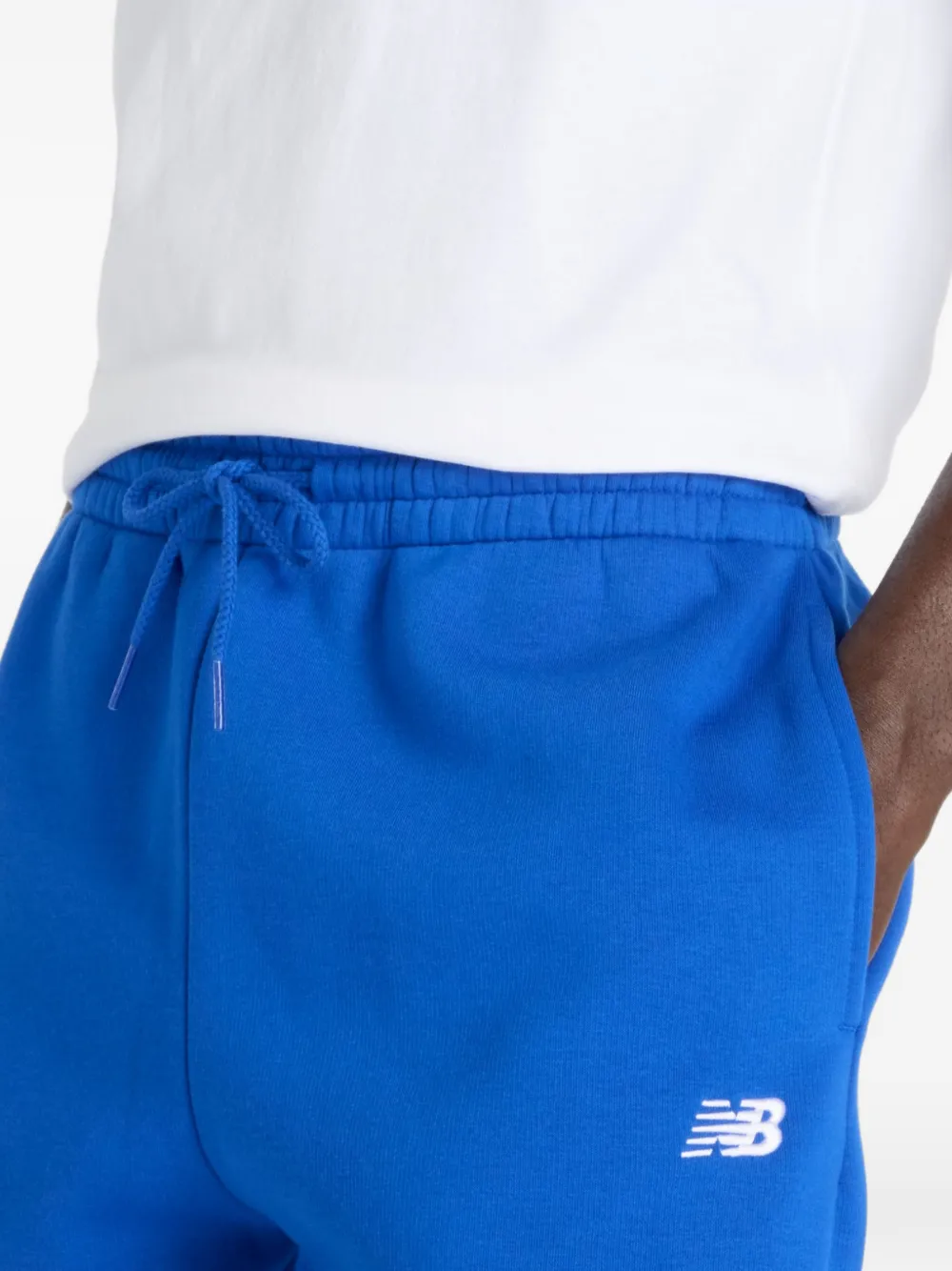 New Balance Joggingbroek met geborduurd logo Blauw