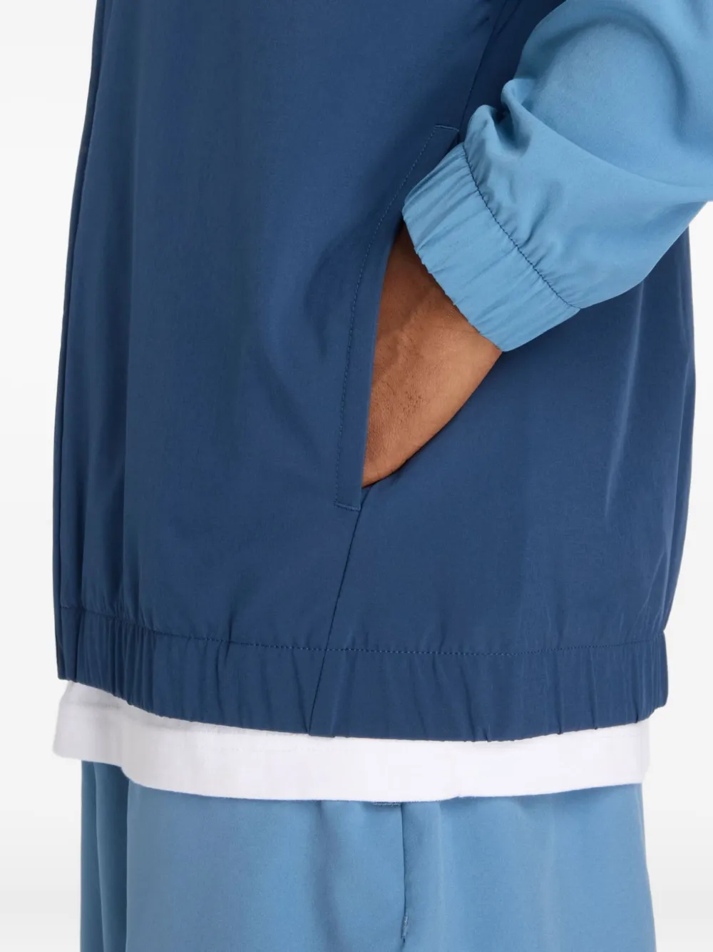New Balance Jersey bomberjack Blauw