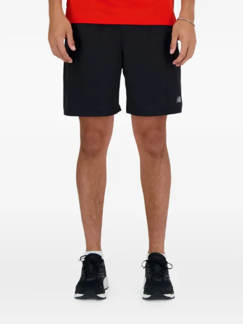 New Balance shorts con detalle del logo