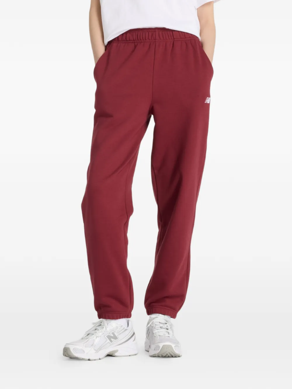 New Balance drawstring-fastening logo-detail track pants - Rosso