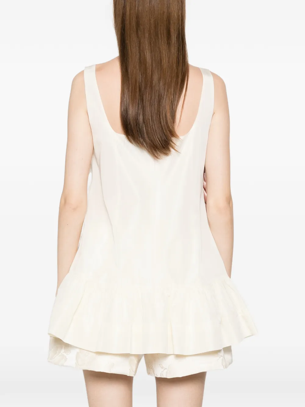 rosette peplum top