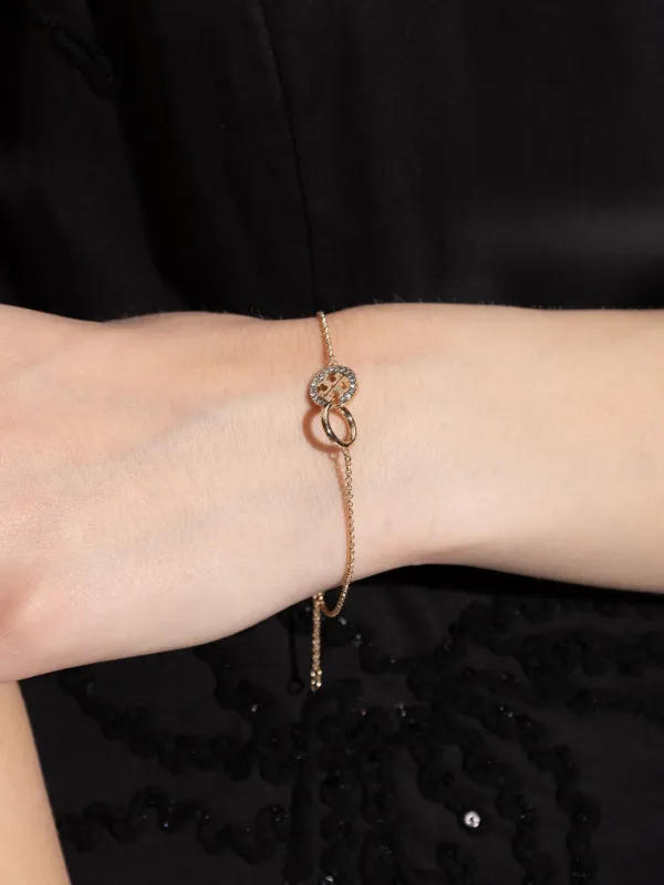 トリーバーチ　ブレスレット　ロゴチャーム　エナメル　グリーン　ゴールドトーン Tory Burch ロゴチャーム ブレスレット | ゴールドトーン | FARFETCH JP