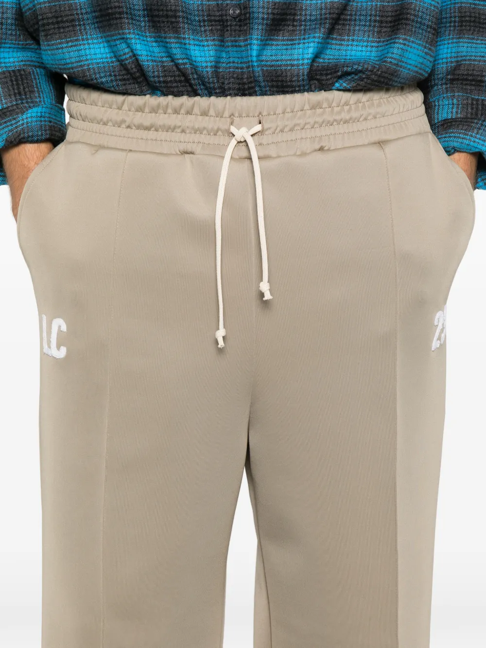 Lc23 Drawstring-fastening Detail Trousers In Neutral