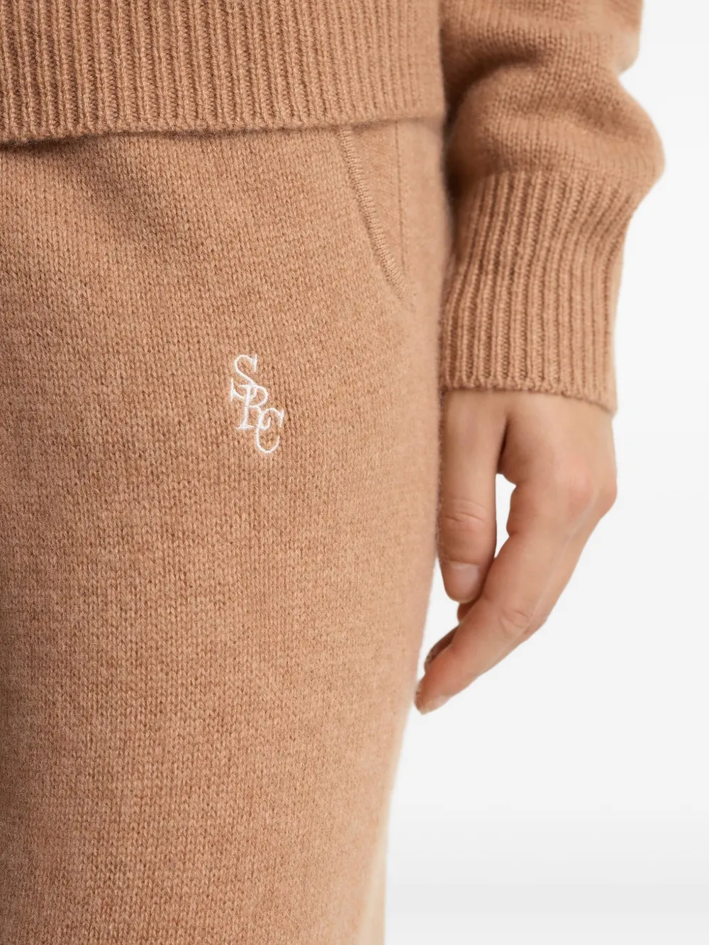 Sporty & Rich Top met borduurwerk en capuchon Beige