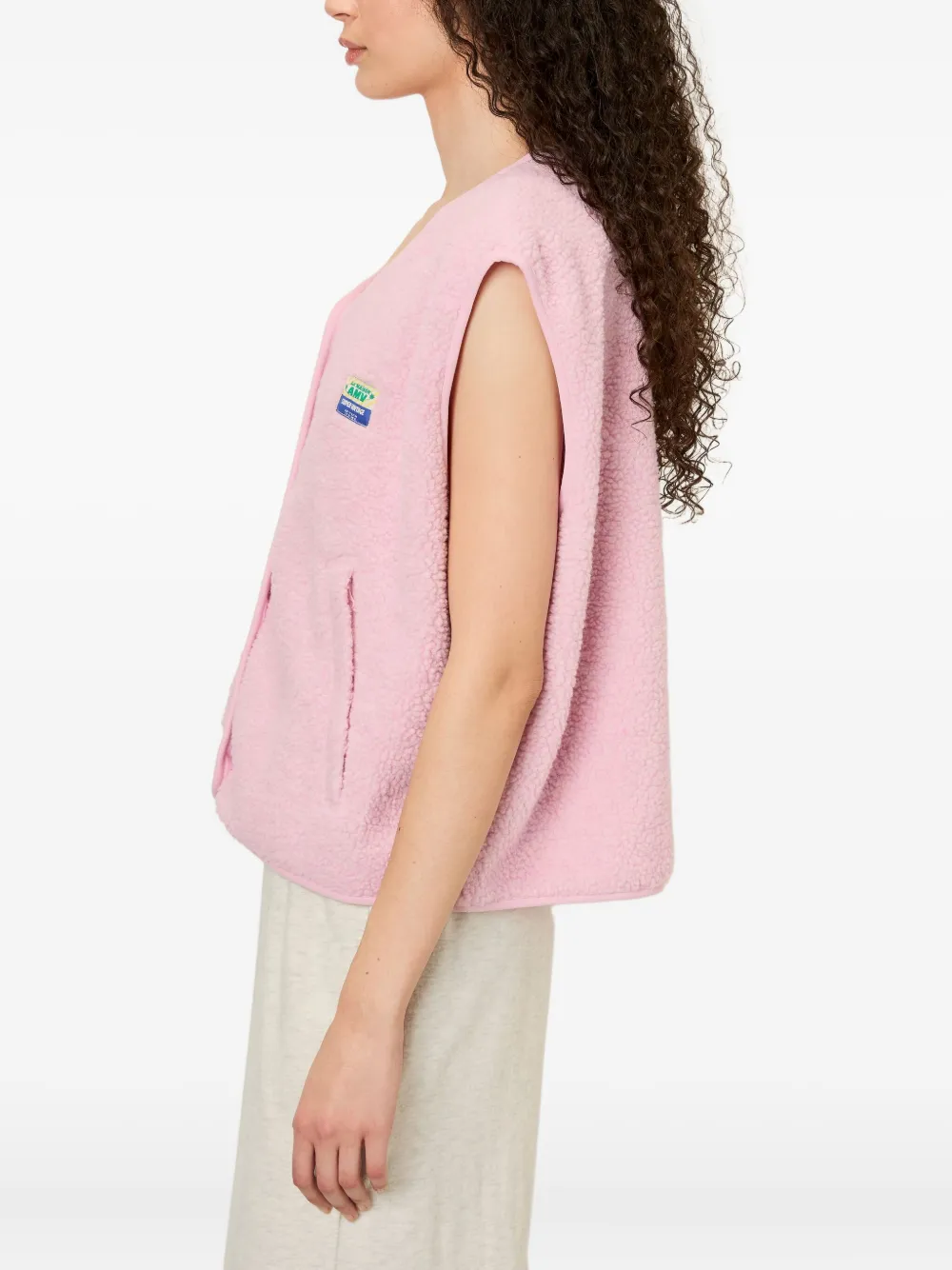 American Vintage Hoktown bodywarmer van imitatielamswol met patch Roze