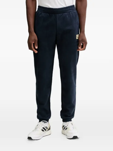 Ea7 Emporio Armani pants con parche del logo