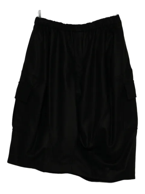 Black Comme Des Garçons asymmetric pocket skirt