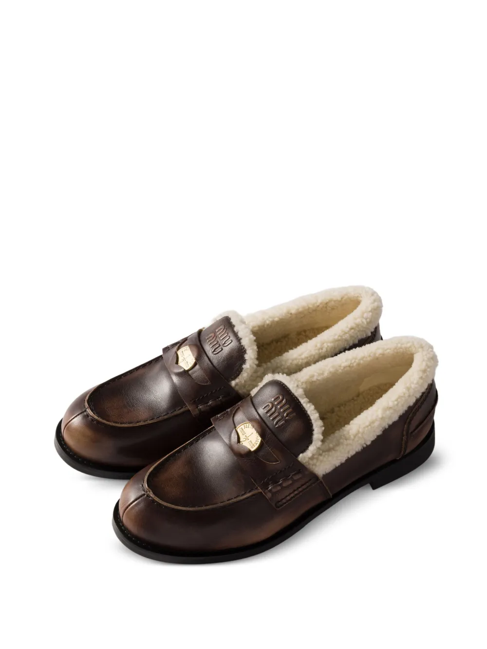 Miu Penny loafers met lammy voering Bruin
