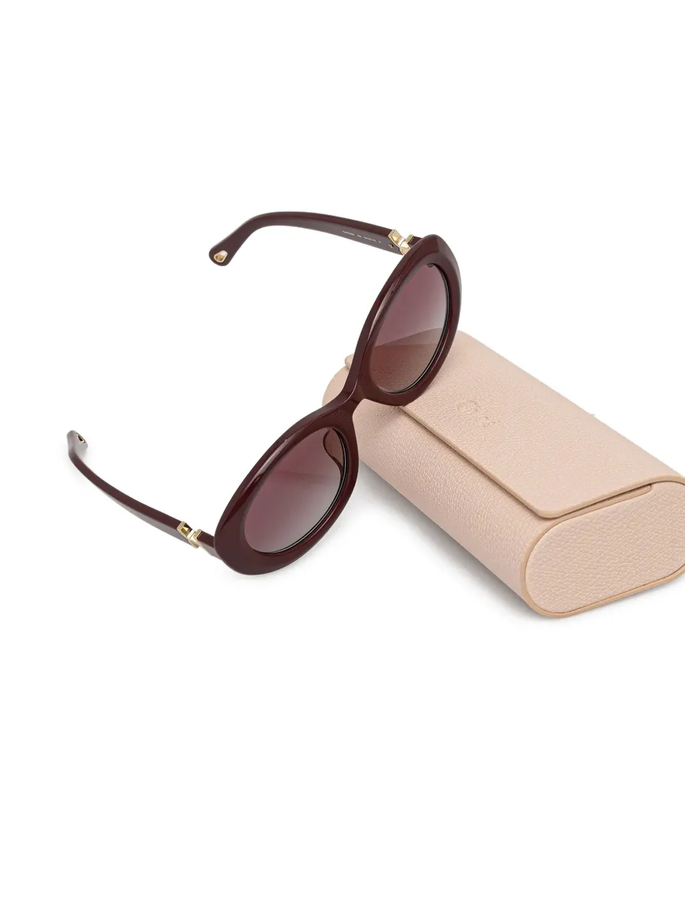 Chloé Eyewear Zonnebril met ovalen montuur Rood