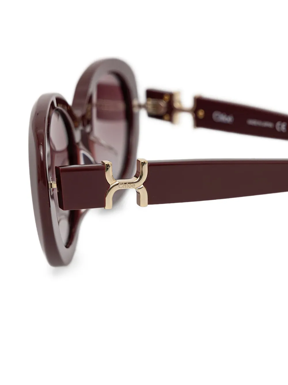 Chloé Eyewear Zonnebril met ovalen montuur Rood