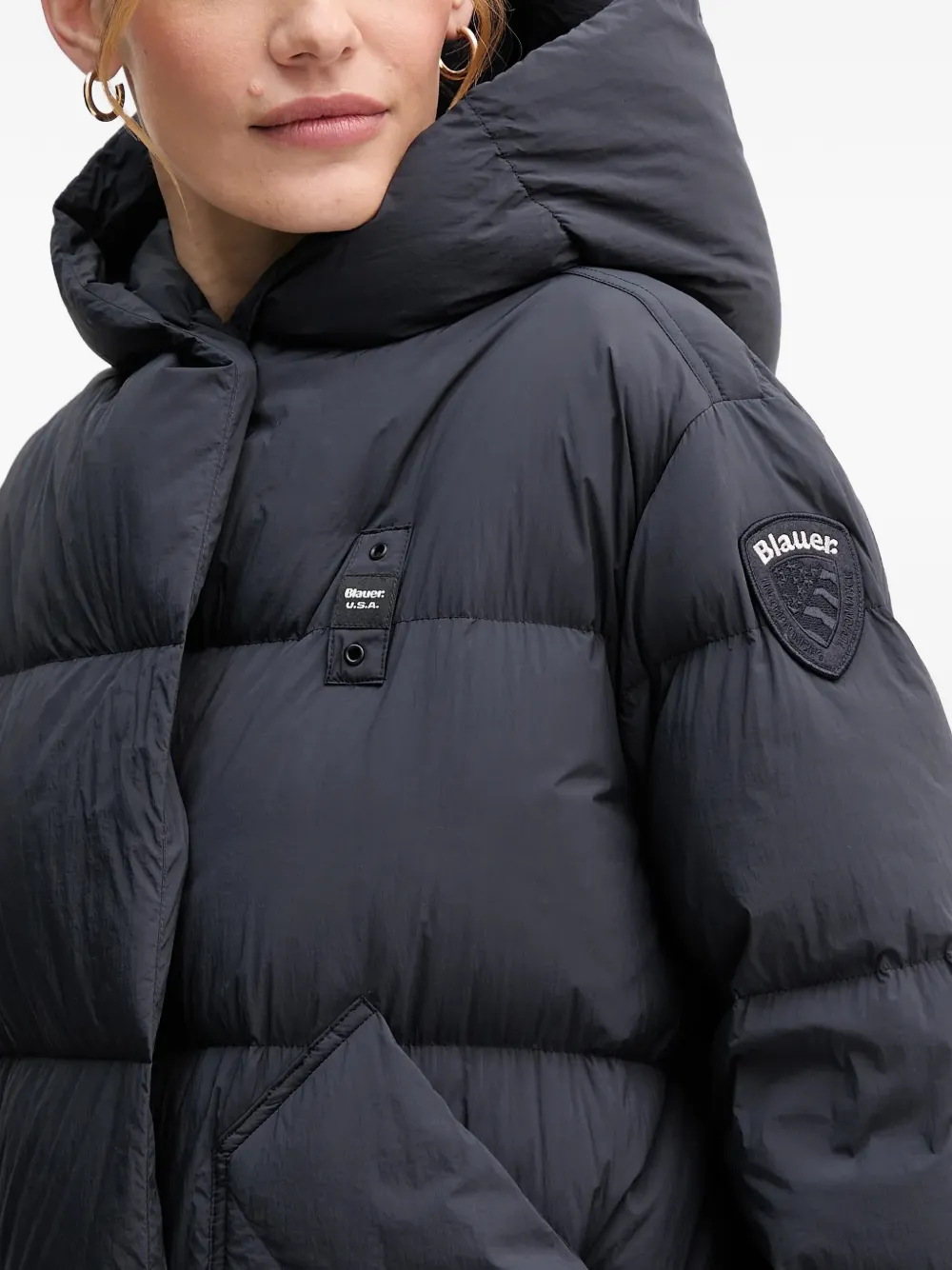 Blauer Gewatteerde jas met capuchon Blauw