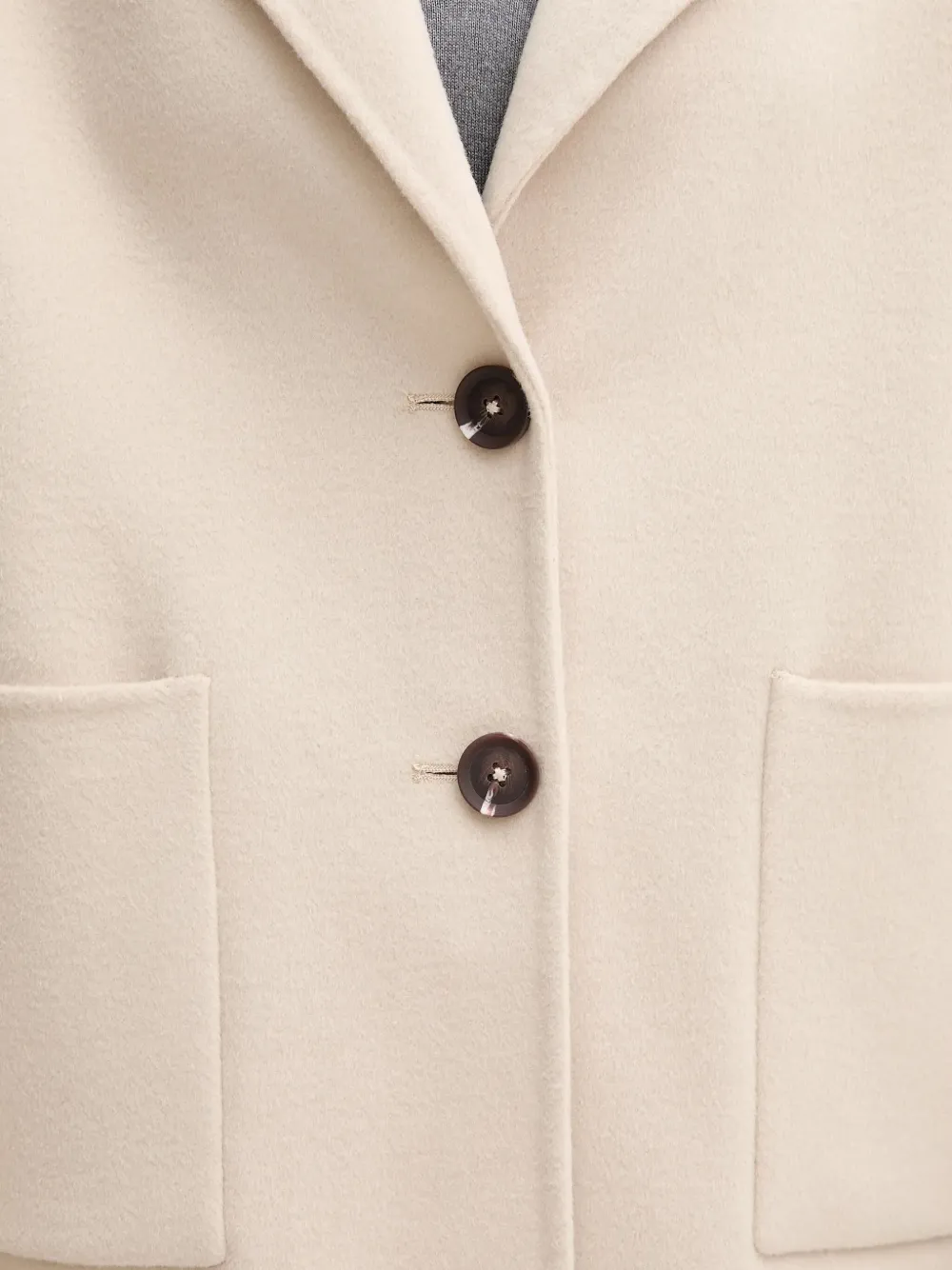Benetton Jas met zak en knoop Beige