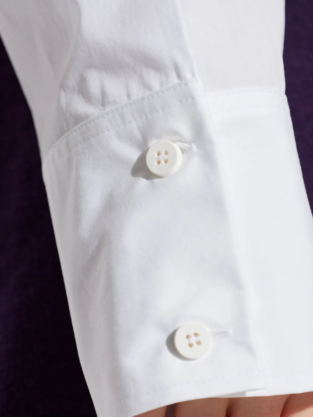 The Attico Top met knopen en lange mouwen Wit