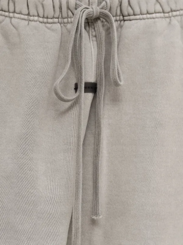 FEAR OF GOD ESSENTIALS Drawstring Flared Track Pants | Grey | FARFETCH