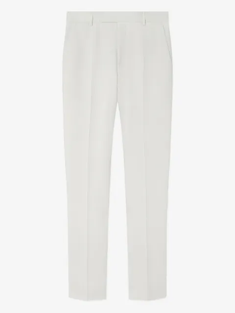 Versace logo-patch trousers