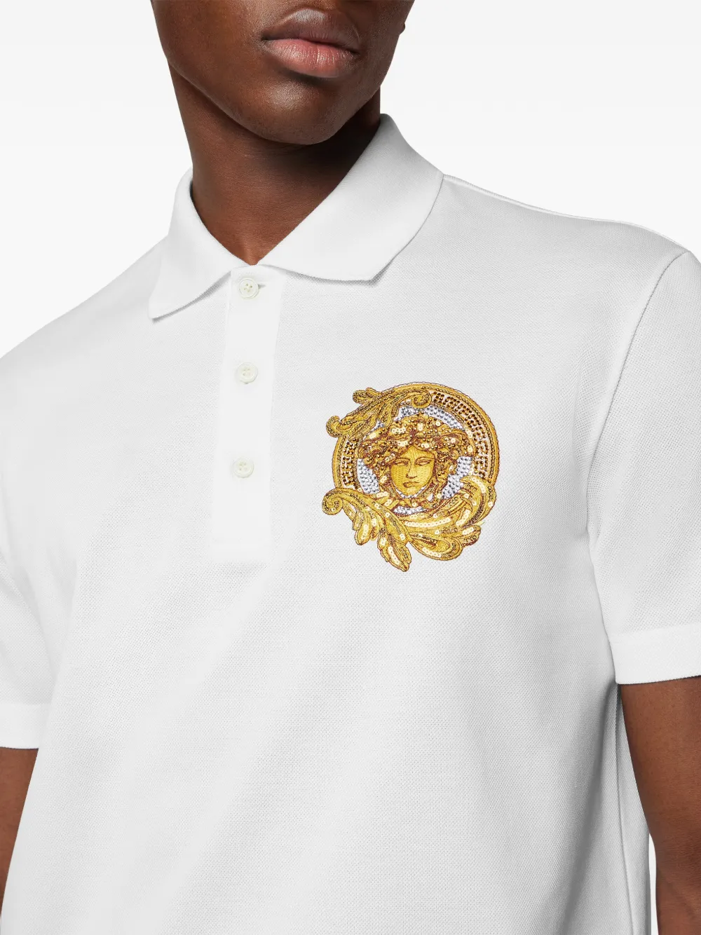 Versace Piqué katoenen poloshirt met borduurwerk Wit