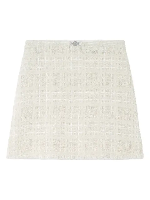 Versace falda corta acampanada con bordes deshilachados