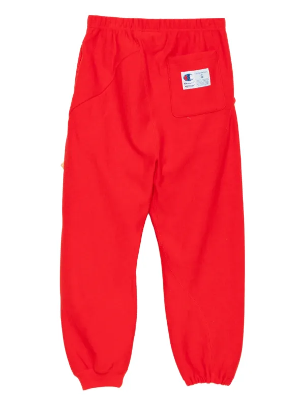 Undercover x Champion ロゴ トラックパンツ | レッド | FARFETCH JP
