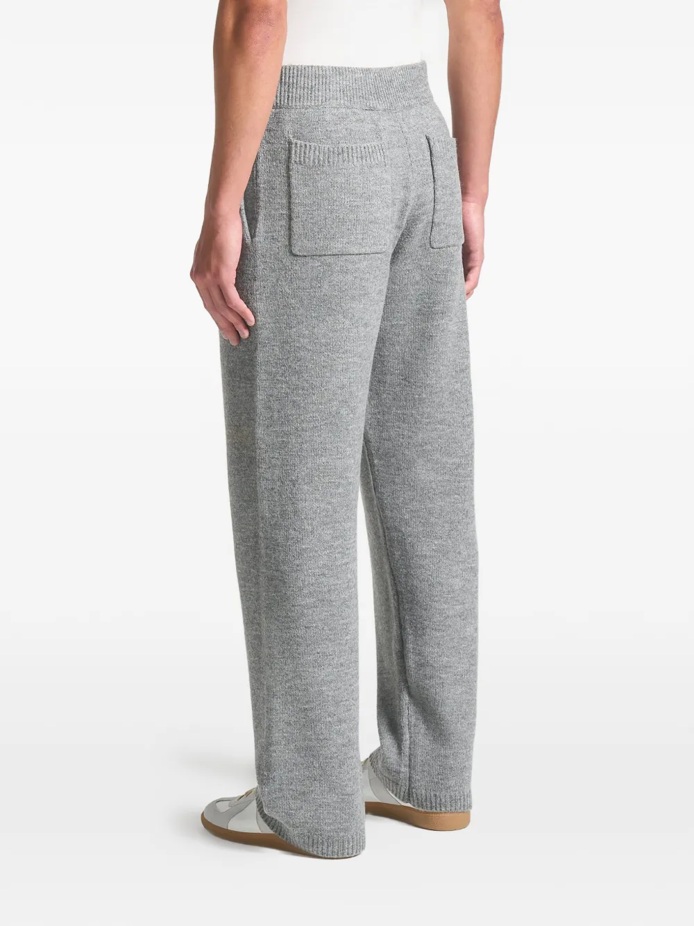 Manière De Voir signature embossed-patch knit track pants Grijs