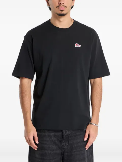 Jordan playera con parche de tenis