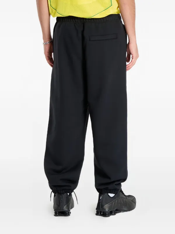 Nike ACG Tuff Fleece トラックパンツ | ブラック | FARFETCH JP