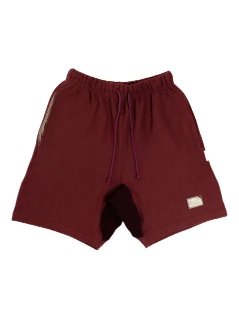 Advisory Board Crystals back patch pocket track shorts