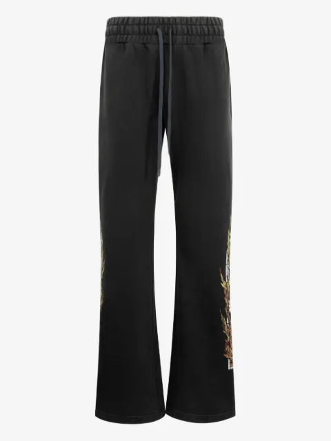 Who Decides War pants Flame Glass