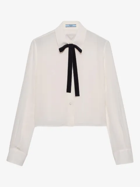 Prada camisa con logo triangular y moño de terciopelo