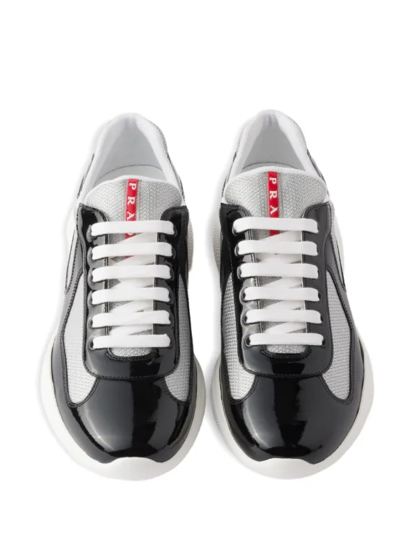 Prada Linea Rossa patent-leather Sneakers | Black | FARFETCH